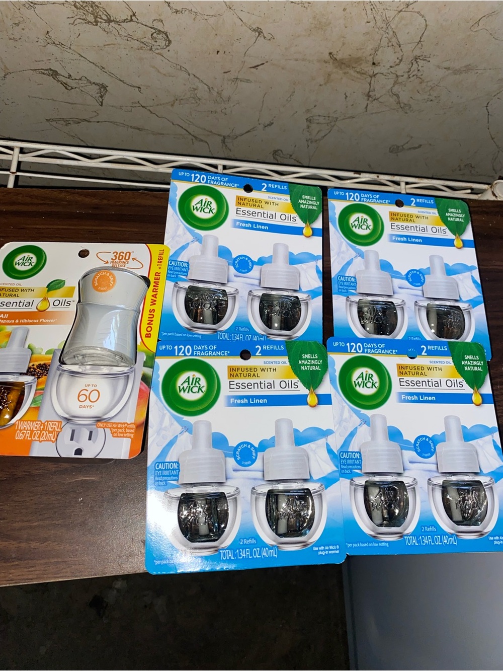 Airwick plug in essential oil fresh linen refill pack